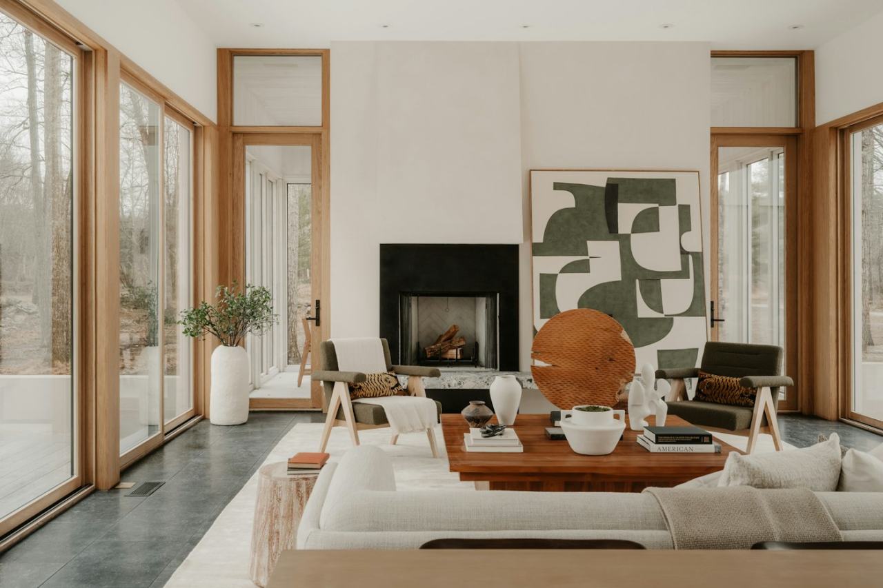 Bright living room with a sofa and large windows